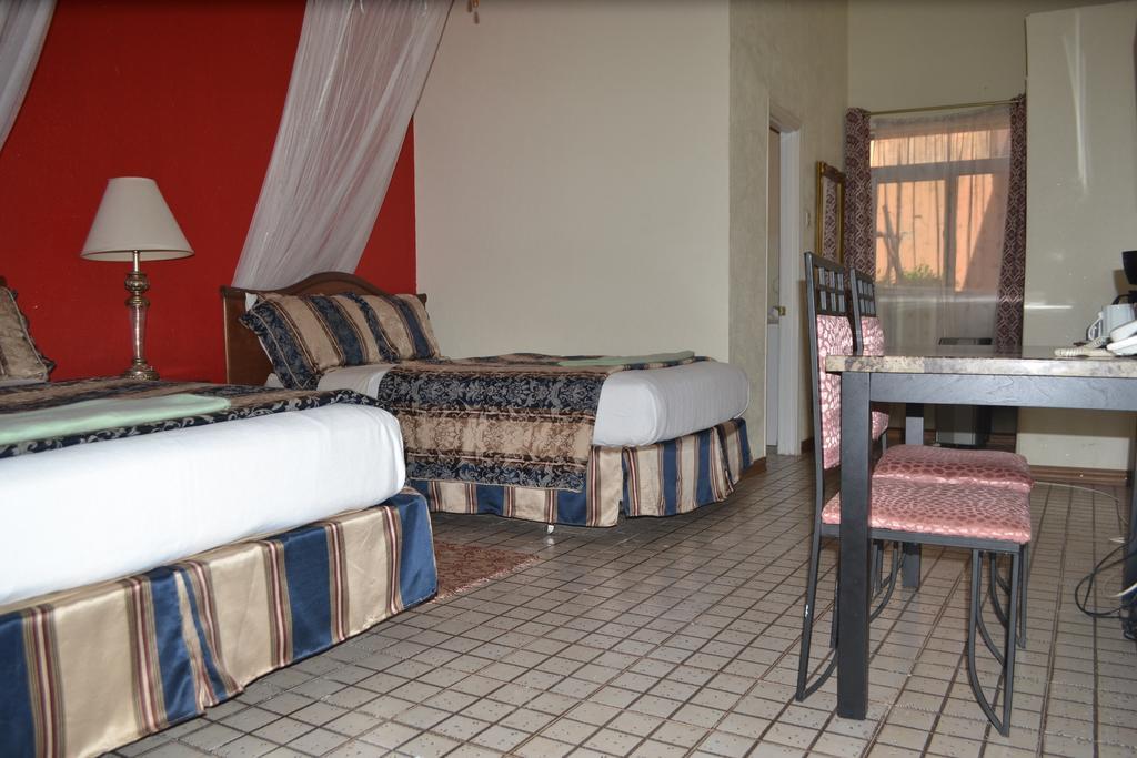 Executive Airport Hotel Энтеббе Номер фото