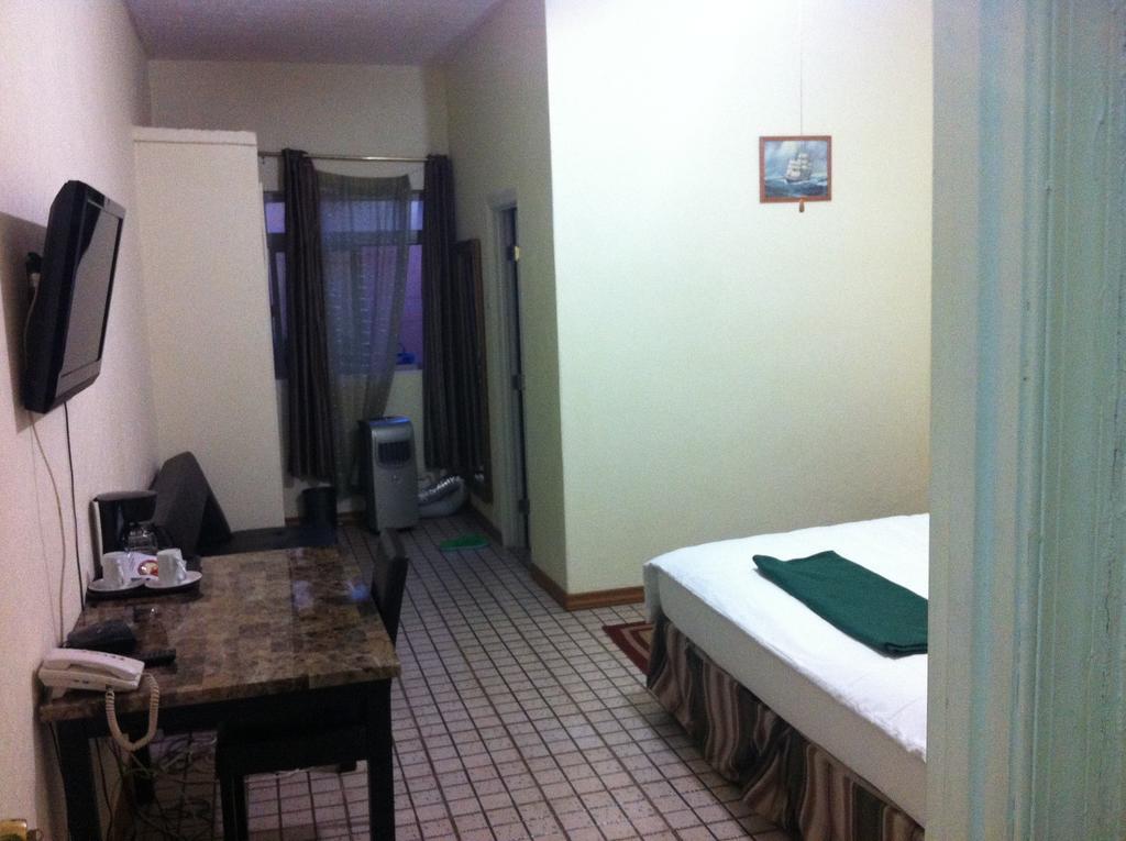 Executive Airport Hotel Энтеббе Номер фото